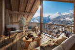 Experience the ultimate alpine retreat with breathtaking mountain views from this stunning balcony.