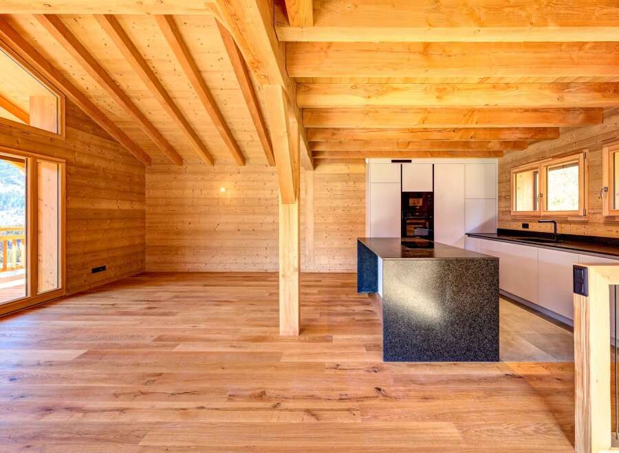 Experience the warmth and charm of this stunning wooden interior.