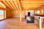 Experience the warmth and charm of this stunning wooden interior.