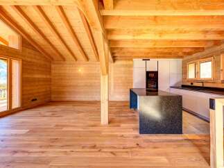 Experience the warmth and charm of this stunning wooden interior.