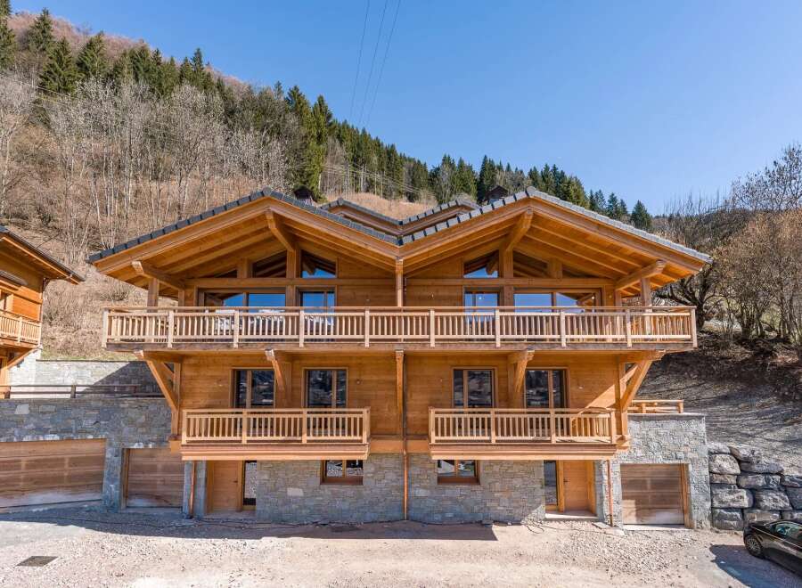 Discover the epitome of alpine luxury in this stunning wooden chalet.