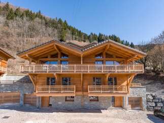 Discover the epitome of alpine luxury in this stunning wooden chalet.