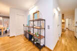 This stunning property boasts a bright and airy hallway with stylish wooden flooring.