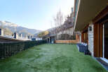 This stunning property boasts a private terrace with artificial turf, perfect for outdoor relaxation.