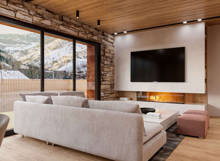 This stunning property boasts a spacious living area with floor-to-ceiling windows offering breathtaking mountain views.