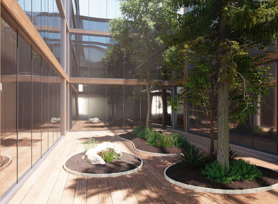 This stunning property boasts a modern glass and wood design, creating a bright and airy atmosphere.