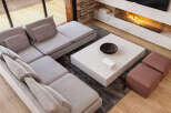 Modern living room with a spacious sectional sofa, a sleek white coffee table, and a stunning fireplace.