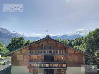 Discover a stunning chalet nestled in the heart of the mountains, offering breathtaking views.