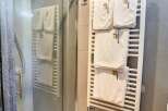 Discover a modern bathroom with a sleek shower enclosure.