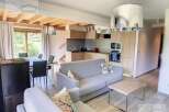 Discover this charming property featuring a modern open-plan living space.