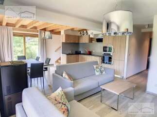 Discover this charming property featuring a modern open-plan living space.