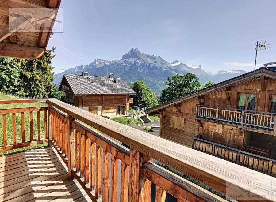 Enjoy breathtaking mountain views from this charming chalet.