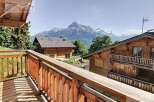 Enjoy breathtaking mountain views from this charming chalet.