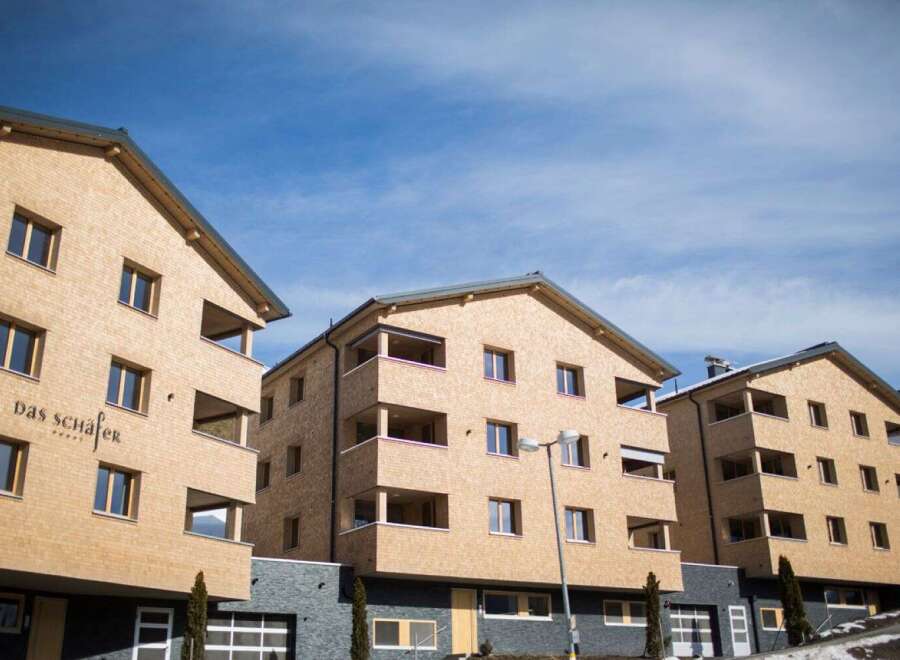 Discover luxurious apartments in this stunning alpine-style complex.