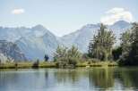 Discover serenity at our lakeside retreat, nestled amidst breathtaking mountain vistas.