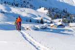 Discover the magic of winter in this idyllic snow-covered village nestled high in the mountains.