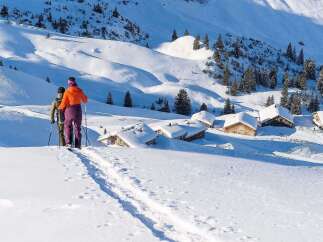 Discover the magic of winter in this idyllic snow-covered village nestled high in the mountains.