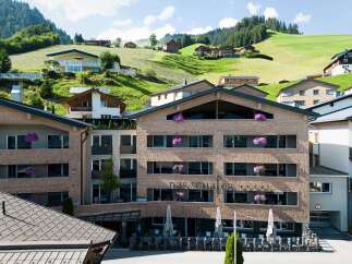 Nestled in a picturesque mountain setting, Das Schafer Hotel boasts stunning views and modern architecture.