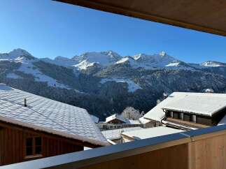 Wake up to breathtaking views of snow-capped mountains from your balcony.