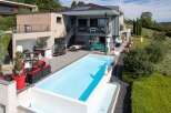 Luxury house with a stunning infinity pool and landscaped gardens.