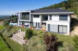 Stunning contemporary home boasts panoramic views and a private pool.