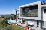 Stunning modern home with a sleek design and expansive outdoor space.