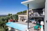 Luxury modern house with infinity pool and stunning views.