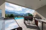 Luxury outdoor kitchen with stunning mountain views.