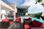 Luxury modern house with stunning pool and mountain views.