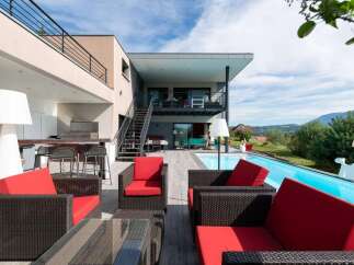 Luxury modern house with stunning pool and mountain views.