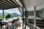 Luxury mountain retreat with infinity pool and private hot tub.
