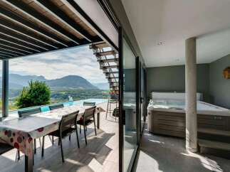 Luxury mountain retreat with infinity pool and private hot tub.