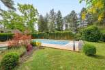 This stunning property boasts a beautiful, secluded pool area, perfect for relaxation and entertaining.