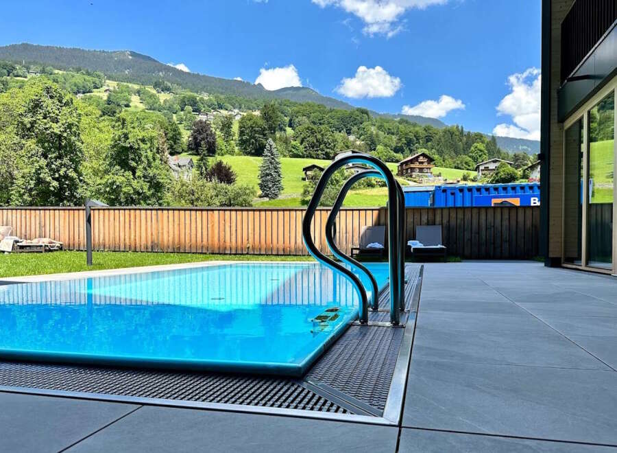 Luxury mountain retreat with private infinity pool offering breathtaking views.