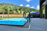 Luxury mountain retreat with private infinity pool offering breathtaking views.