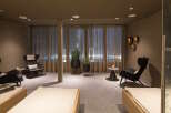 Relax and unwind in our luxurious spa, featuring comfortable lounge chairs, warm lighting, and a tranquil atmosphere.
