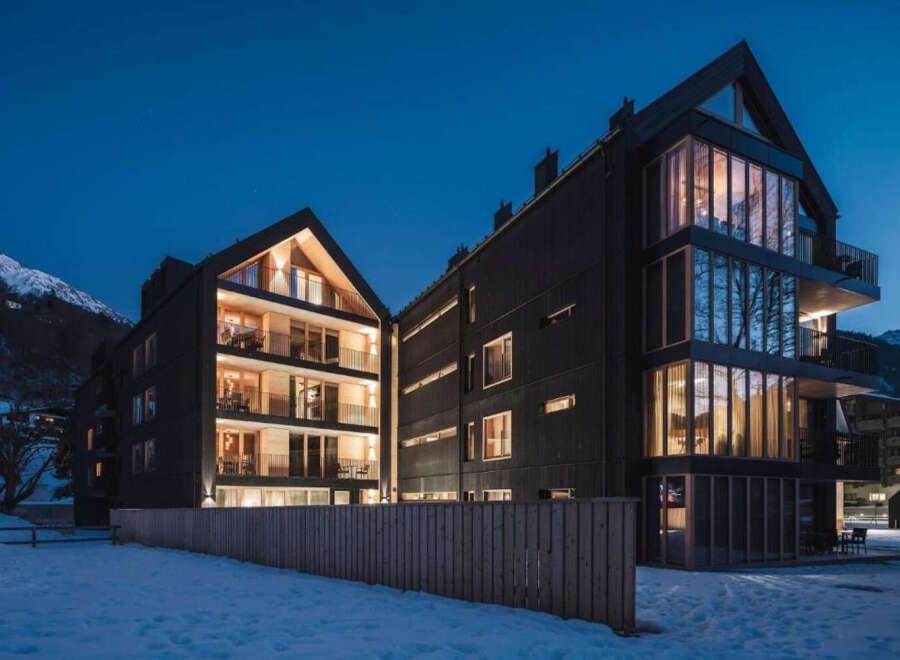 Discover luxurious apartments nestled in a stunning mountain setting.