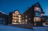 Discover luxurious apartments nestled in a stunning mountain setting.