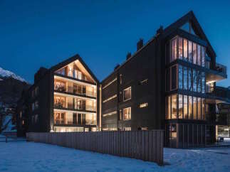Discover luxurious apartments nestled in a stunning mountain setting.