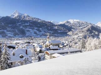 Nestled in a picturesque snowy mountain valley, this charming village offers breathtaking views and a peaceful atmosphere.