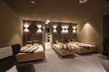 Relax and unwind in our luxurious spa, featuring comfortable heated loungers perfect for post-treatment relaxation.