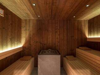 Indulge in tranquility within this exquisitely designed sauna, showcasing rich, dark wood paneling and ambient lighting.