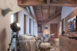 Rustic mountain chalet with exposed wood beams and a cozy living area.
