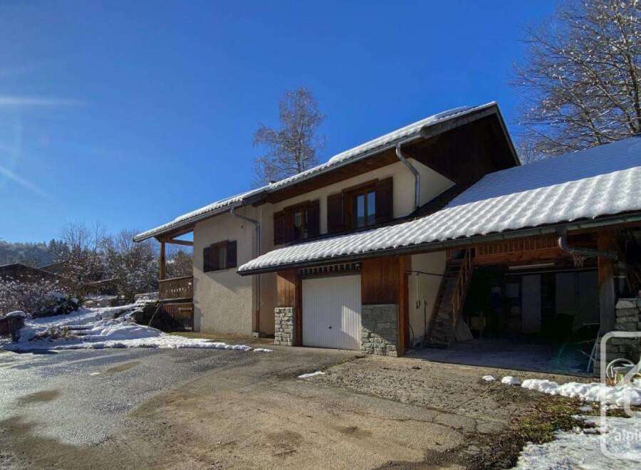 This stunning chalet boasts a spacious garage, perfect for storing all your winter sports equipment.