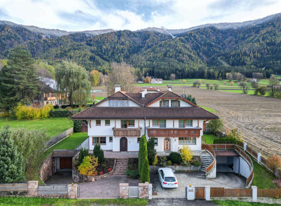 Stunning mountain home with a charming facade and a welcoming entrance.