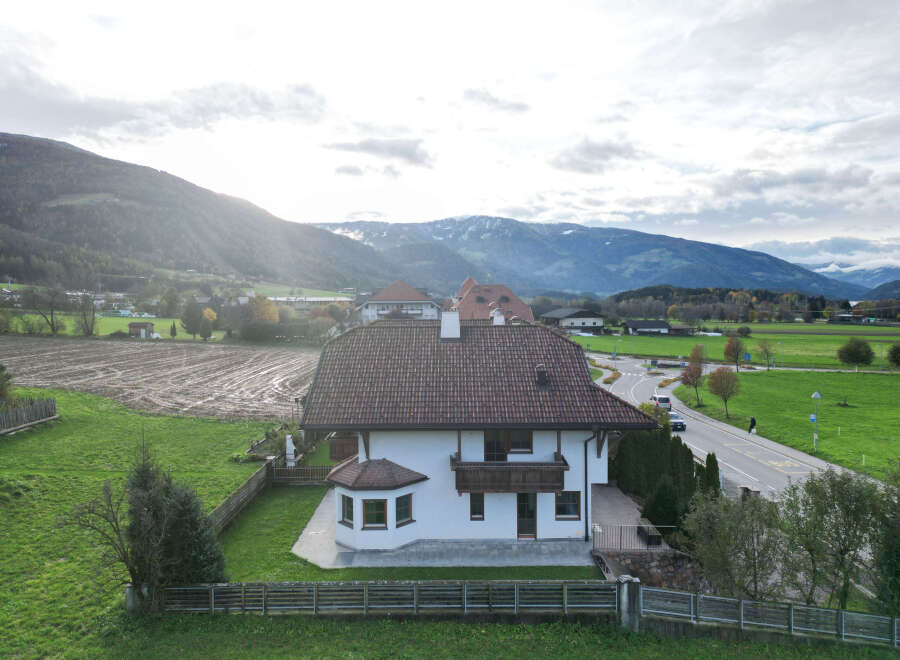 Discover a charming home nestled in a picturesque landscape.