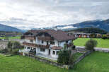 Discover a stunning property nestled in a picturesque mountain setting.