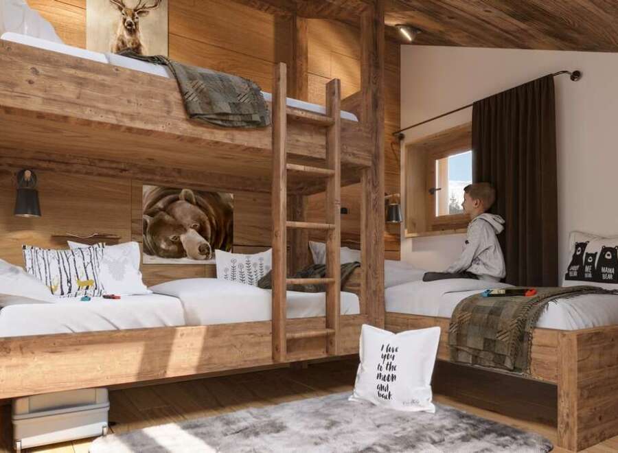 Rustic-chic bunk beds create a cozy haven in this charming chalet bedroom.