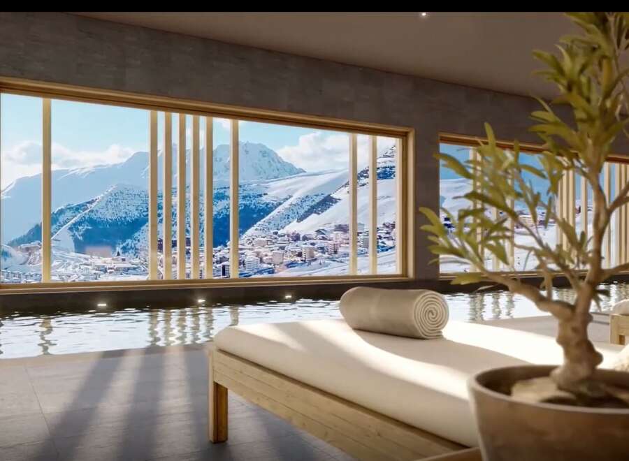 Luxury mountain spa with indoor pool and stunning views.
