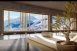 Luxury mountain spa with indoor pool and stunning views.